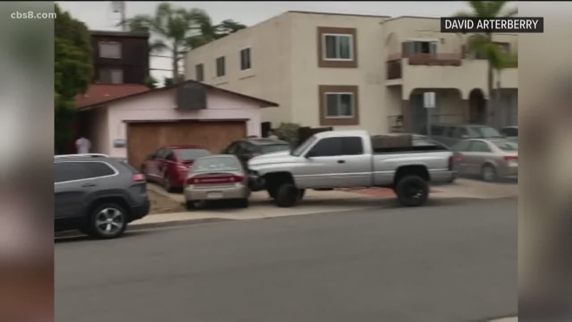 Video captured the man driving erratically and smashing into parked cars along Shasta Street while neighbors watch – afraid for their own safety.