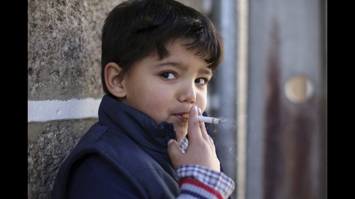 Portuguese town encourages children to smoke at Epiphany