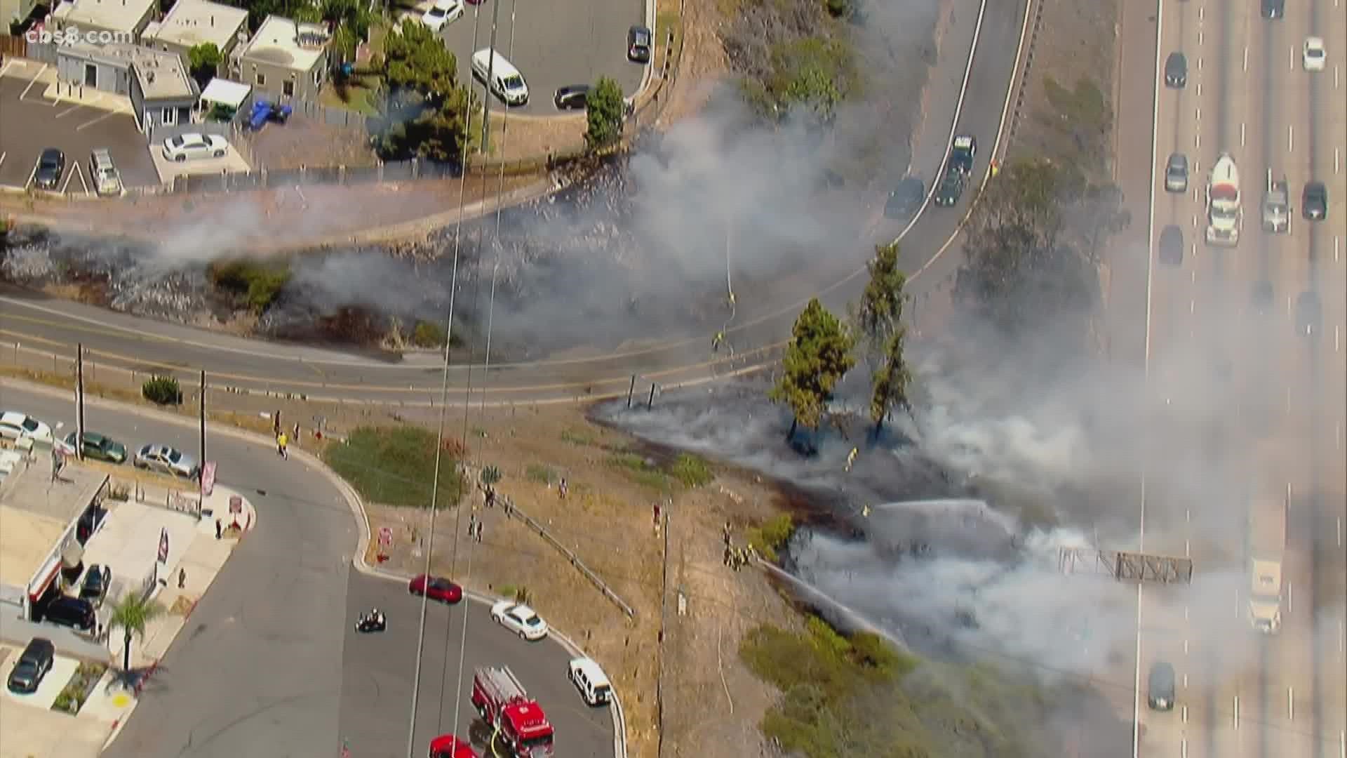 Fire crews fight vegetation fire near 1-805 and South Park in San Diego ...