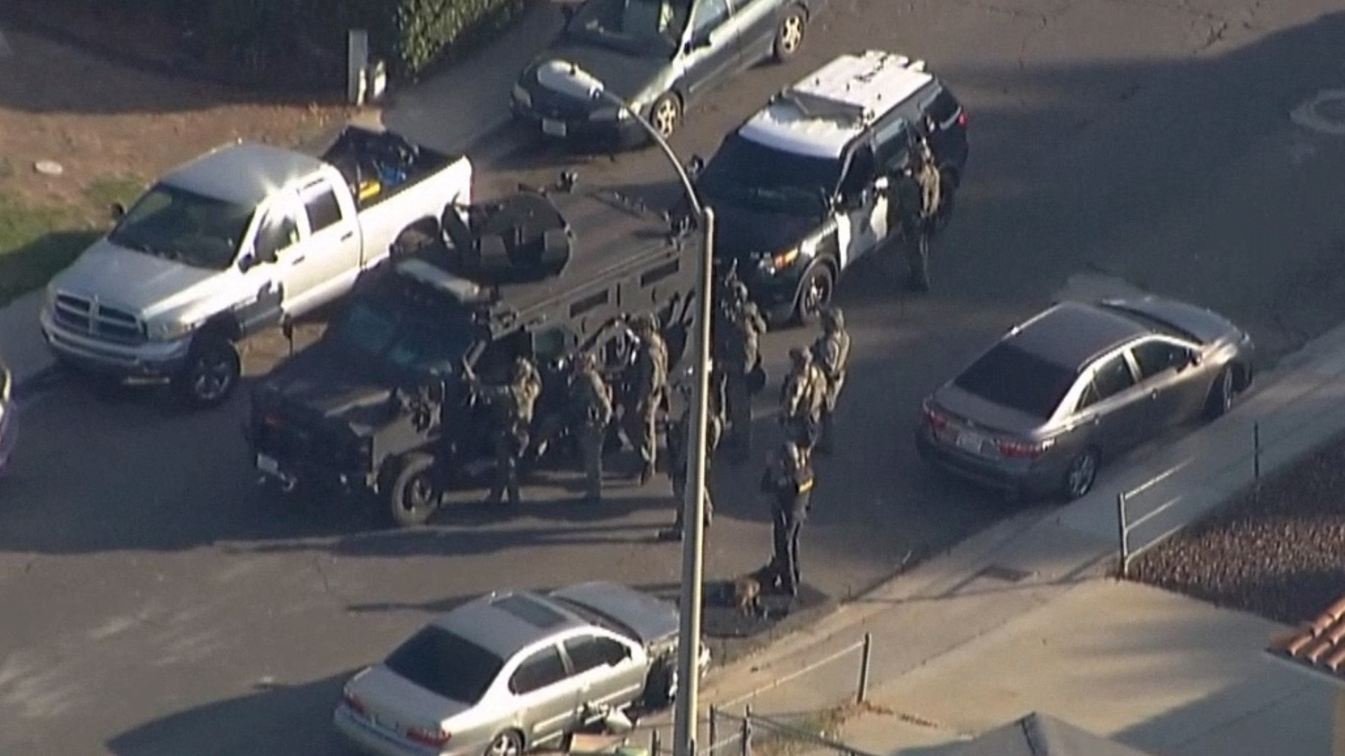 Wanted fugitive surrenders peacefully after prompting SWAT standoff in ...