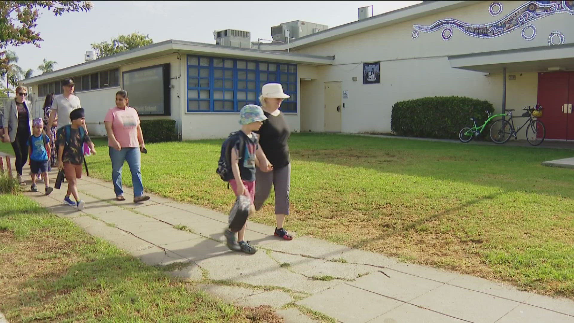 Parents and kids gathered outside Alice Birney Elementary, excited for the new school year.