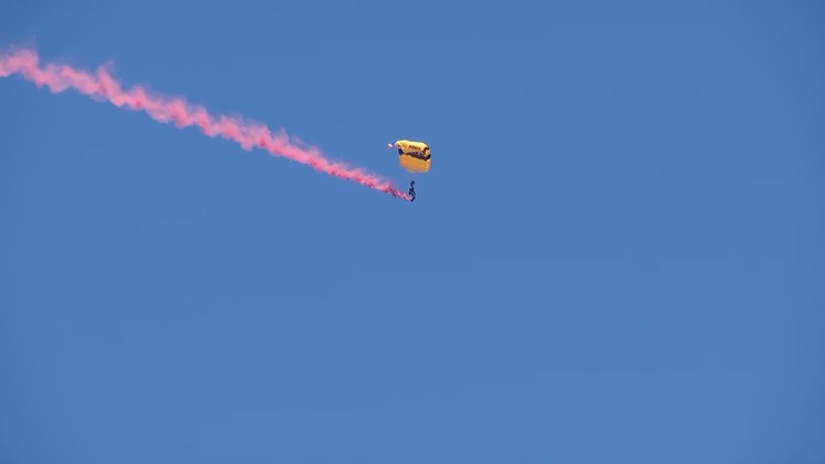 The Golden Knights make parachute jump to USS Midway flight deck