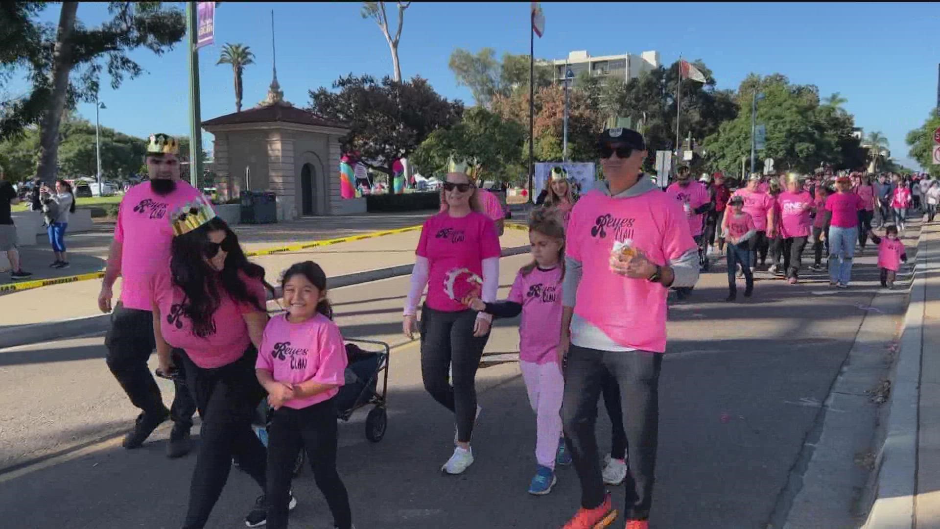 Thousands of breast cancer survivors and supporters walked 2.2 miles in a sea of pink through the heart of Balboa Park.