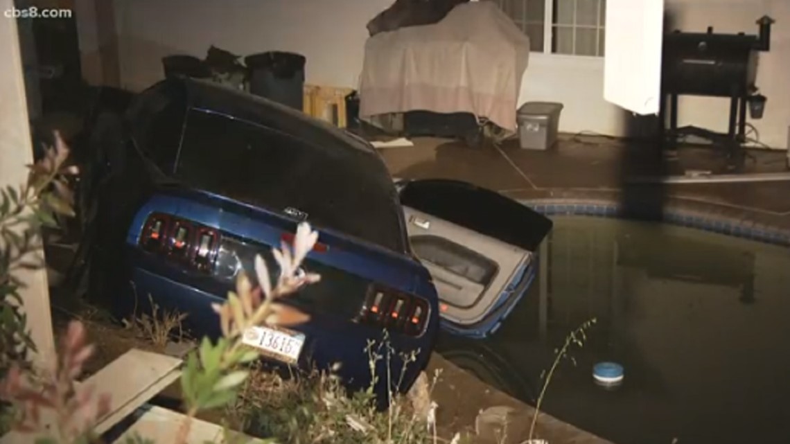 Mustang crashes through fence, nearly lands in swimming pool at El ...