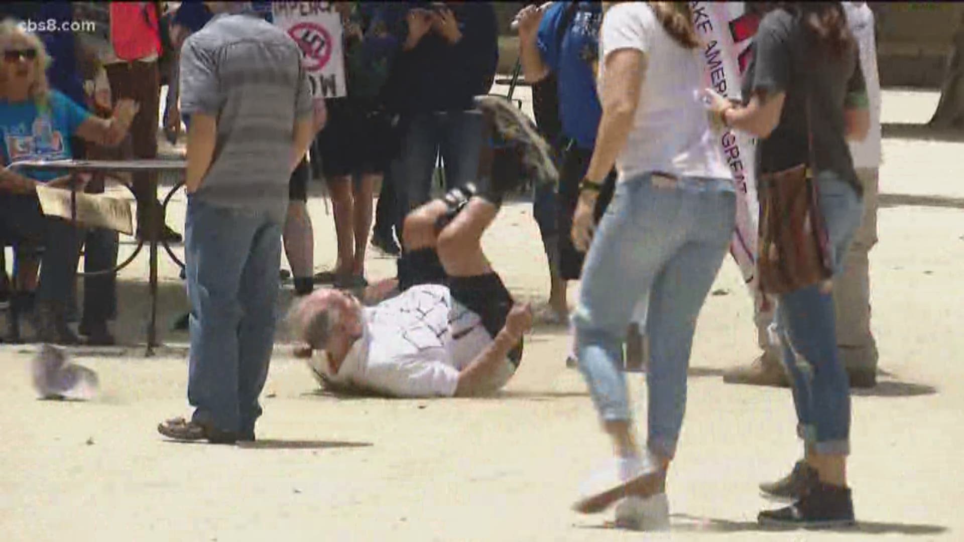 The incident started after a man protesting the president shoved supporters of the president.