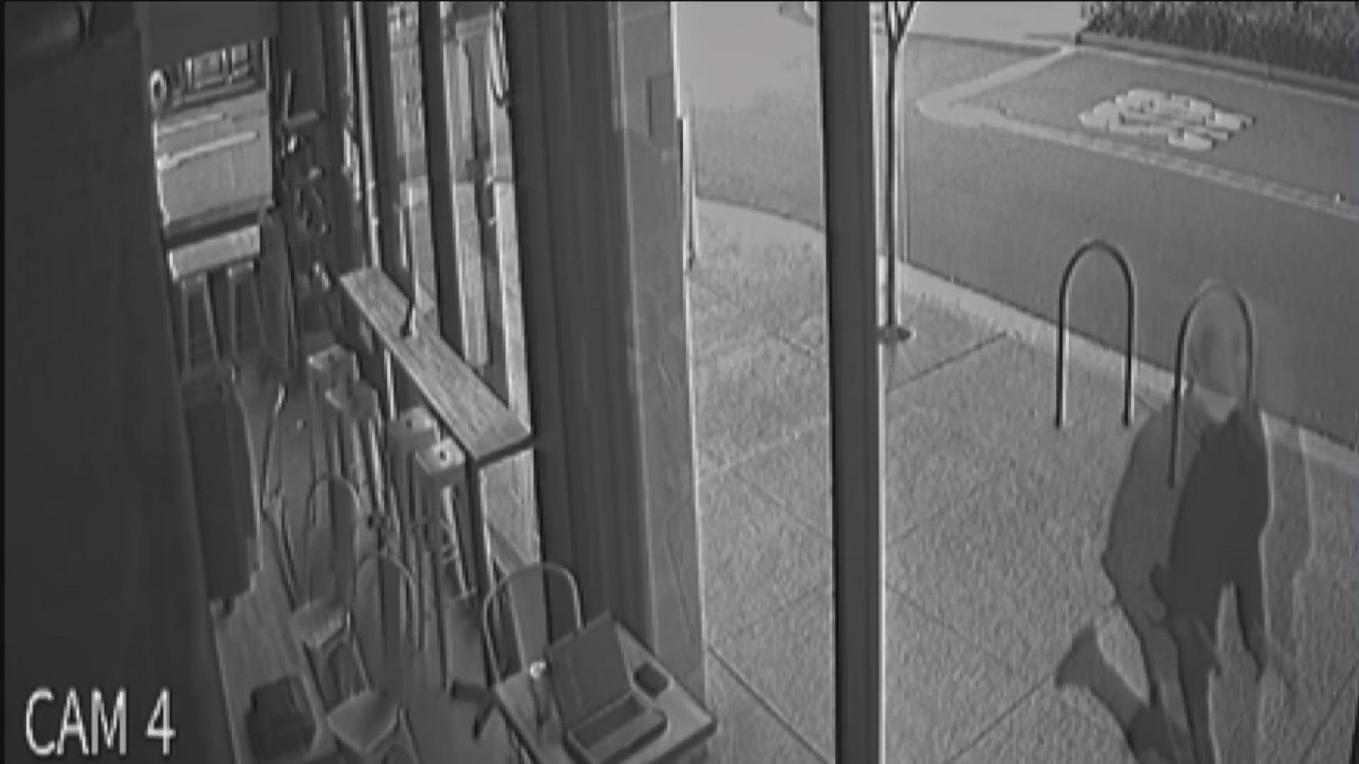 Surveillance video captures an armed man fleeing the San Diego Central Library shooting.