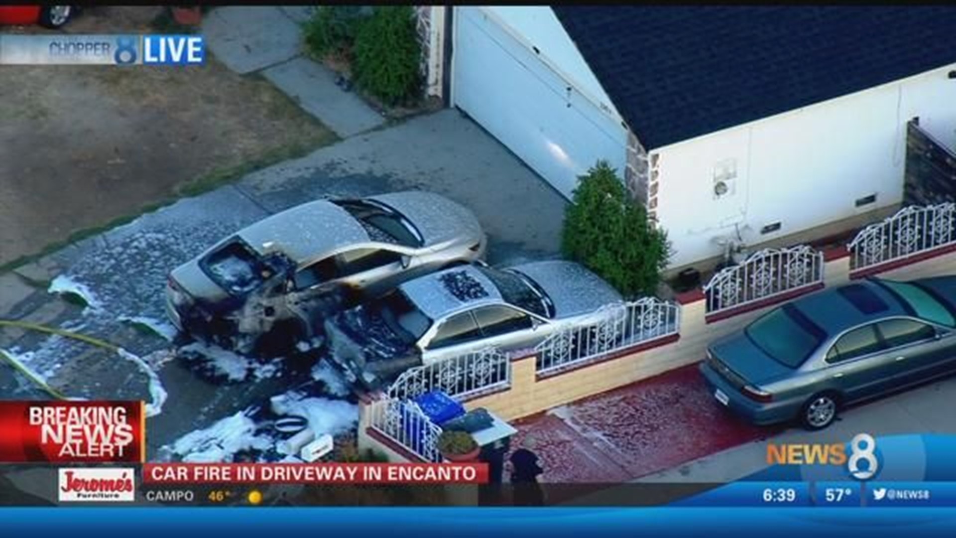Two cars go up in flames in front of Encanto home