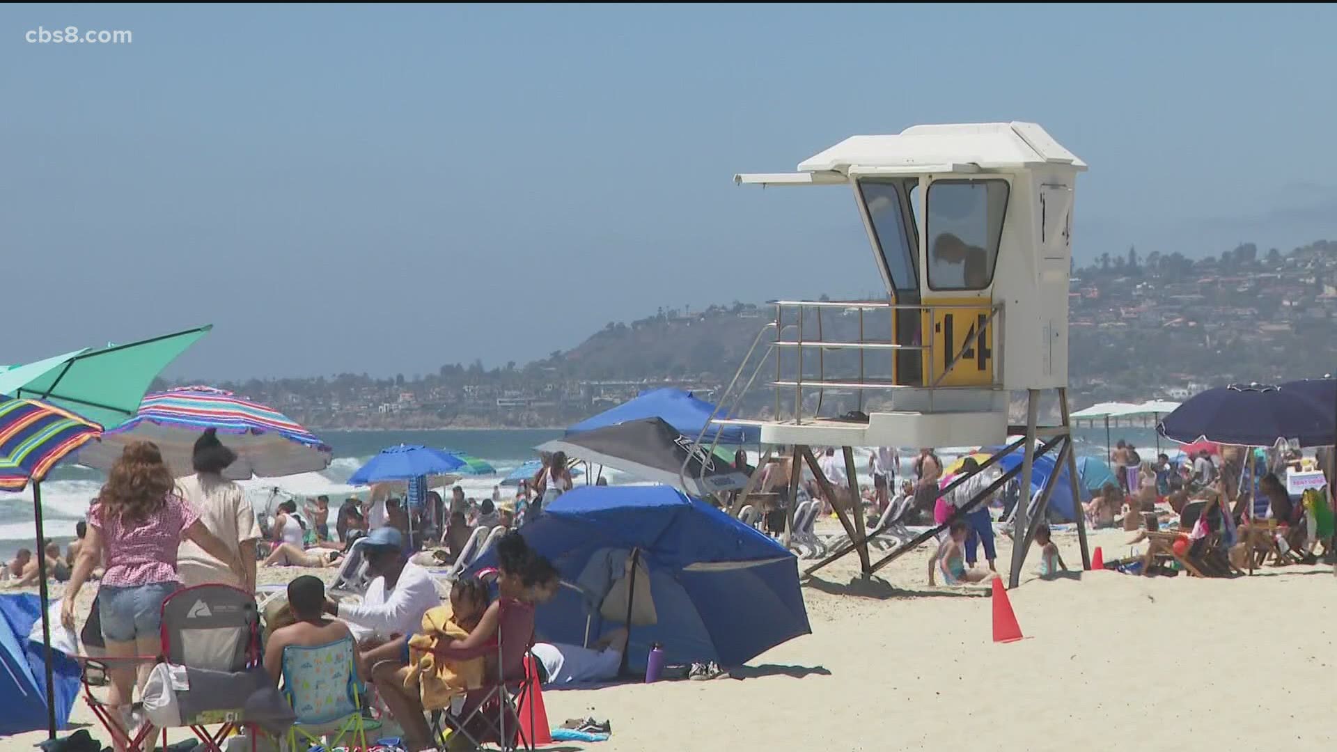 As the heat turns up, the crowds are turning out at the coast to cool off, which is leading to more work for local lifeguards.