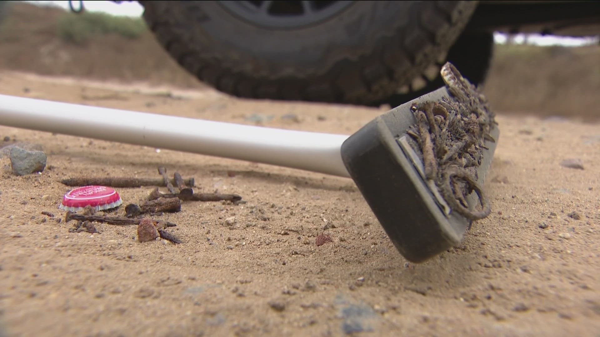 Beachgoers who continually burn pallets and other items outside designated firepit areas left hundreds of nails, glass, and other objects buried behind.