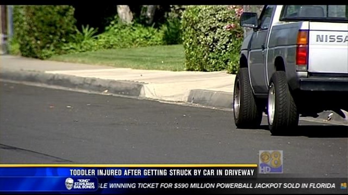 Toddler injured after getting struck by car in driveway