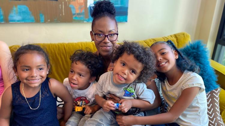 Single mother and 3 children receive home filled with furnishings