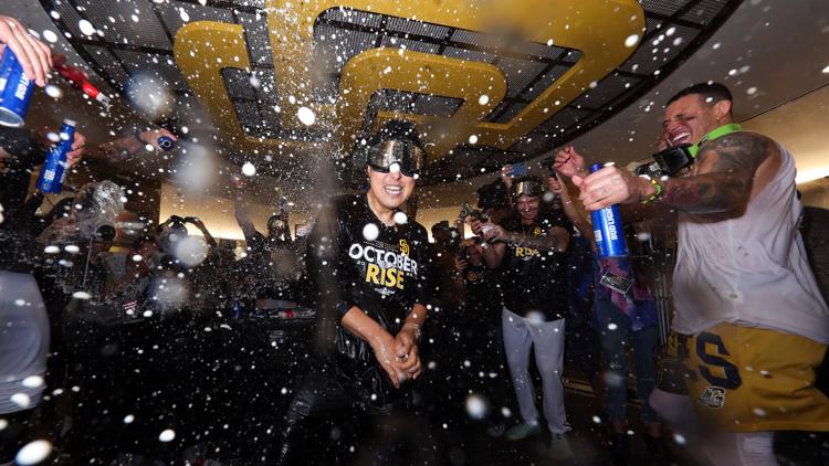 PHOTOS | Padres celebrate after clinching playoff spot