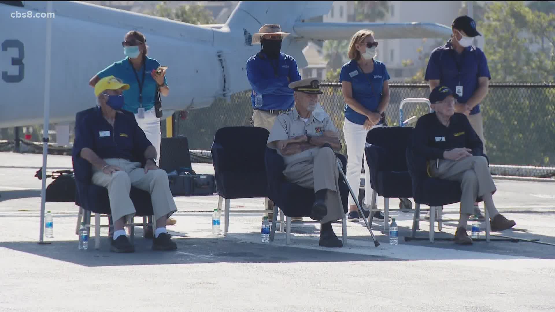 Three Navy veterans were on board to participate in the ceremony that included the laying of a wreath.