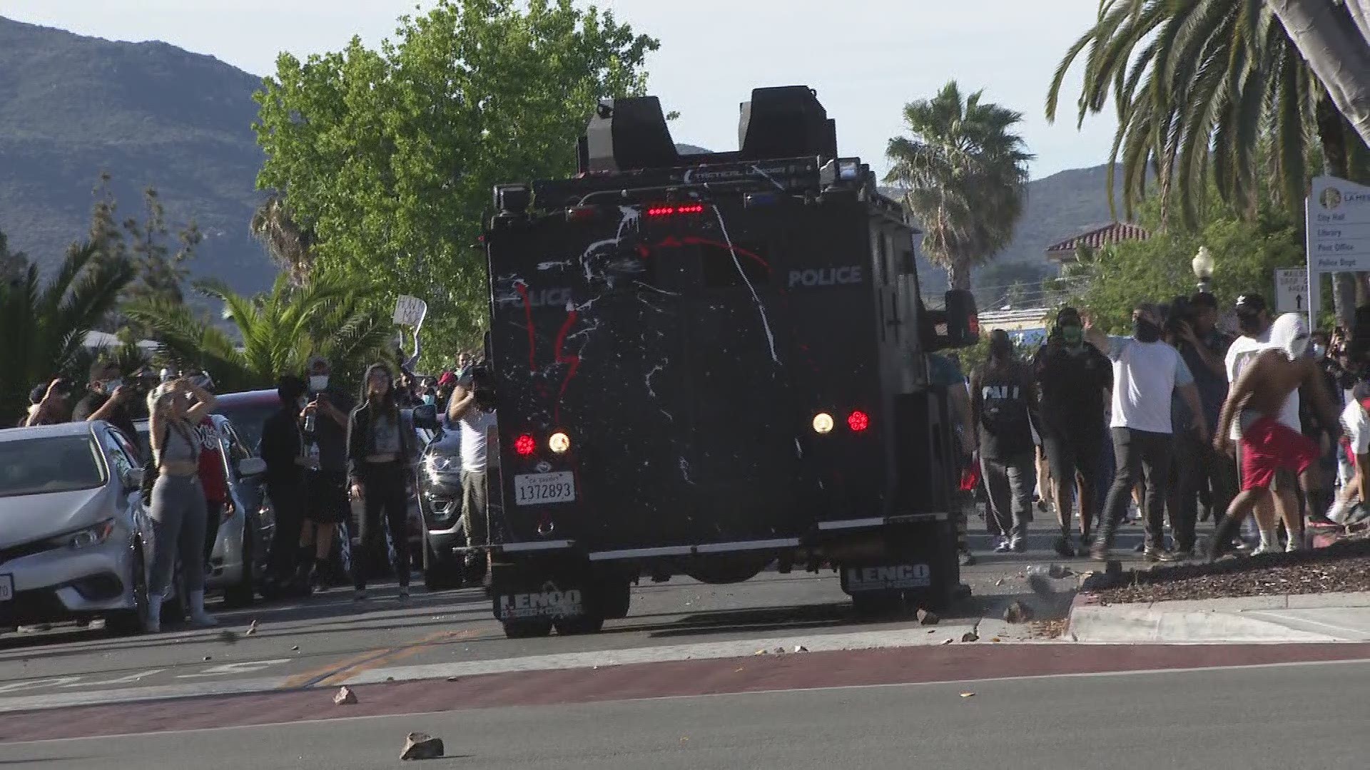 Demonstrators have attacked an armored vehicle and the La Mesa Police HQ.