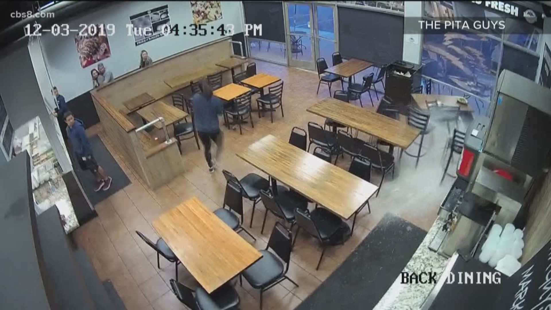 In the video you can see a woman puts a plate of food down, then walks away. Seconds later, a car comes crashing into the restaurant exactly where she was standing.