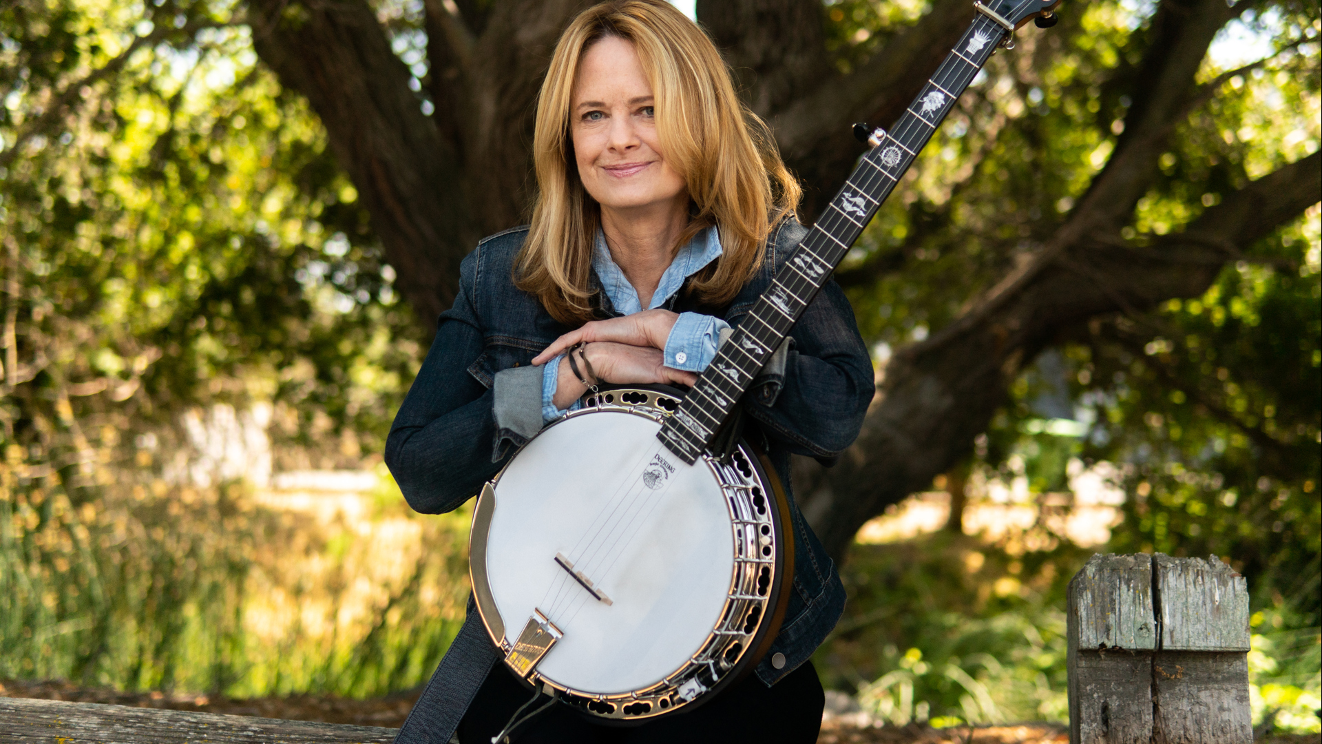 Bluegrass musician Alison Brown teamed up with actor and banjo player Steve Martin for two #1 hits.