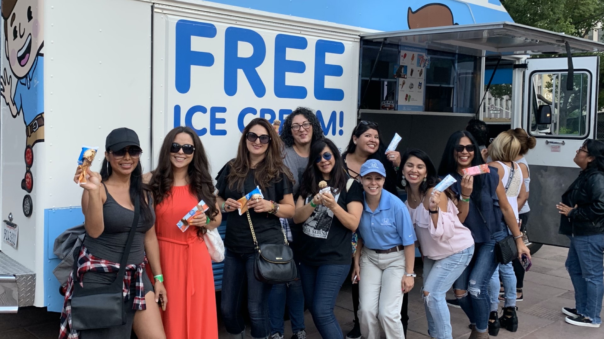 Hundreds of children receive tasty treats from the Helpful Honda Free Ice Cream Truck.