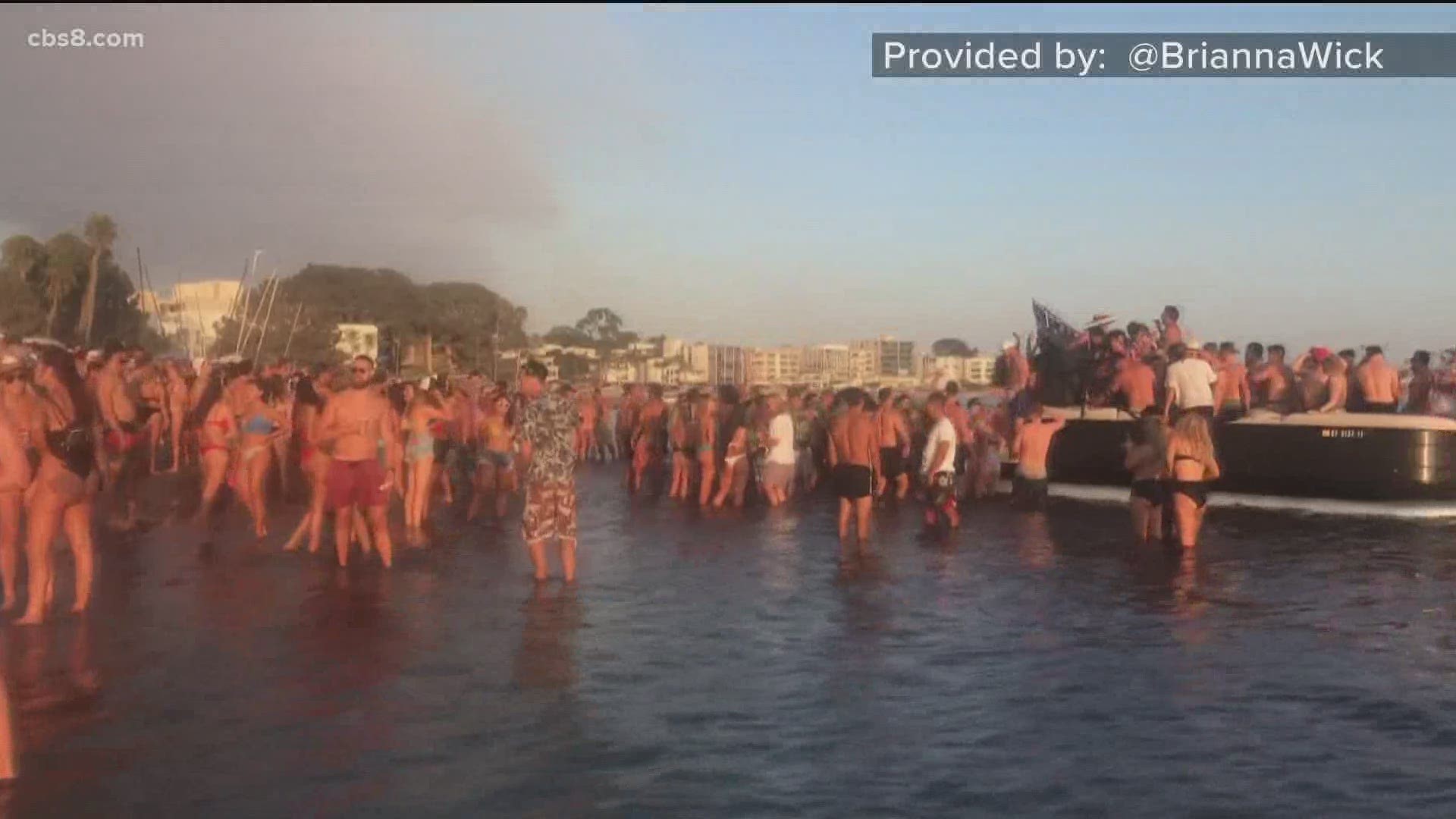 Cell phone video shows maskless partiers in the water, on boats, and sharing drinks - everything health officials warned against ahead of Labor Day.