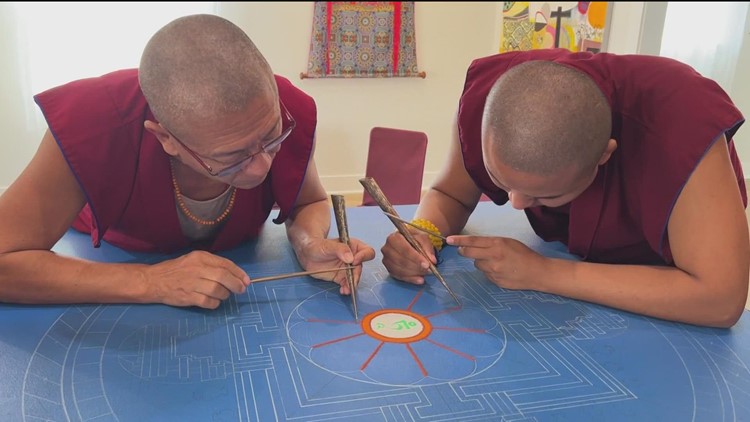 Tibetan Monks creating mandala in Carlsbad, teach lessons of impermanence