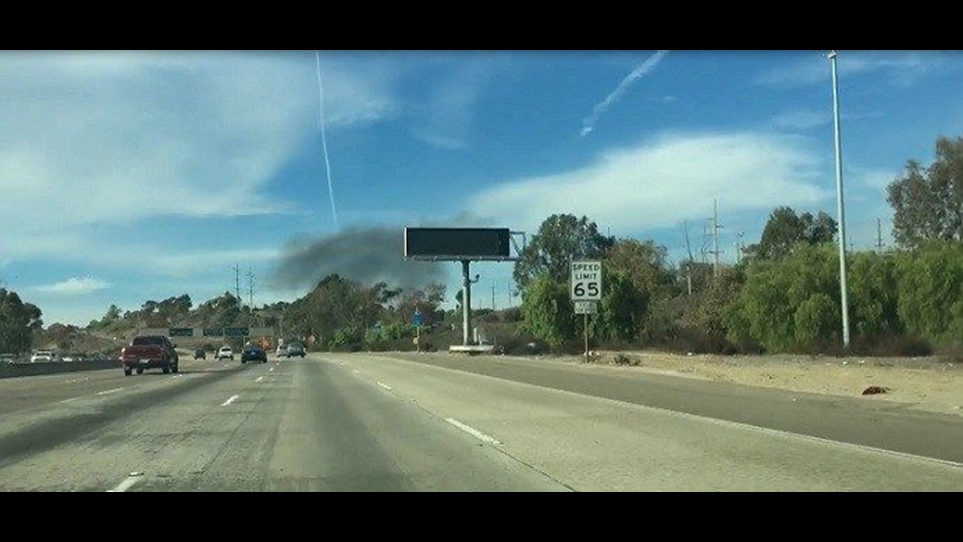 Crews battle brush fire in Linda Vista | cbs8.com