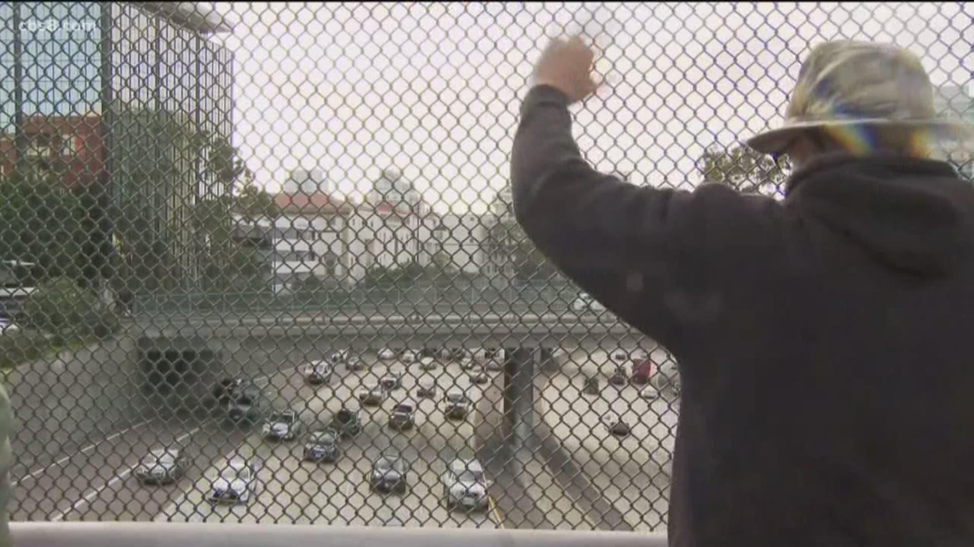 Veterans stood on a bridge overlooking the freeway, urging others to avoid "endless wars."