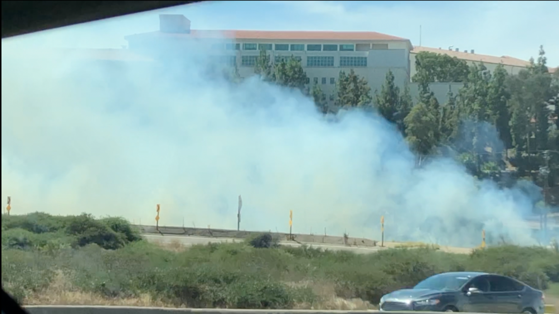 Cell phone video shot from a car headed westbound on I-8 near SDSU.