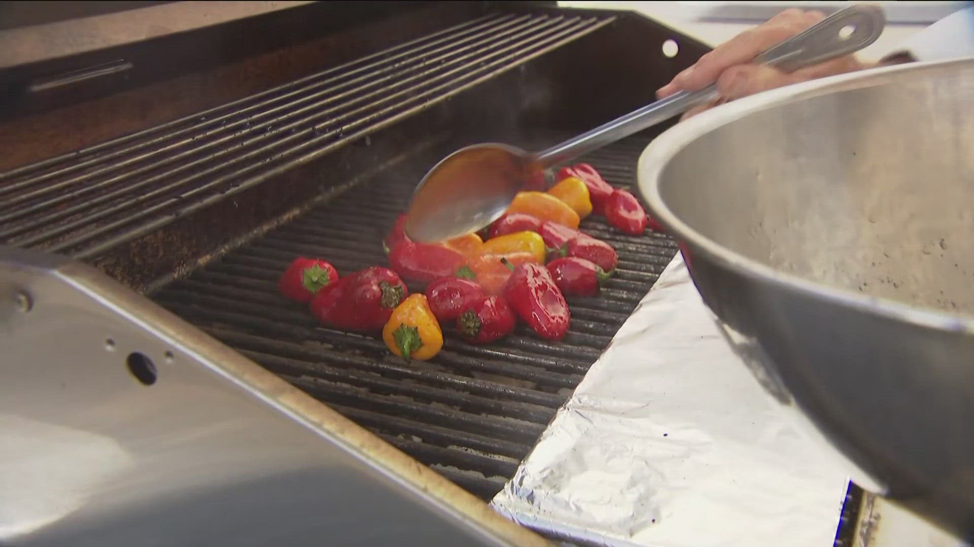 Shawn gets the peppers on the grill and gets the Fresh Corn Sweet Pepper Salad ready with a homemade vinaigrette dressing.