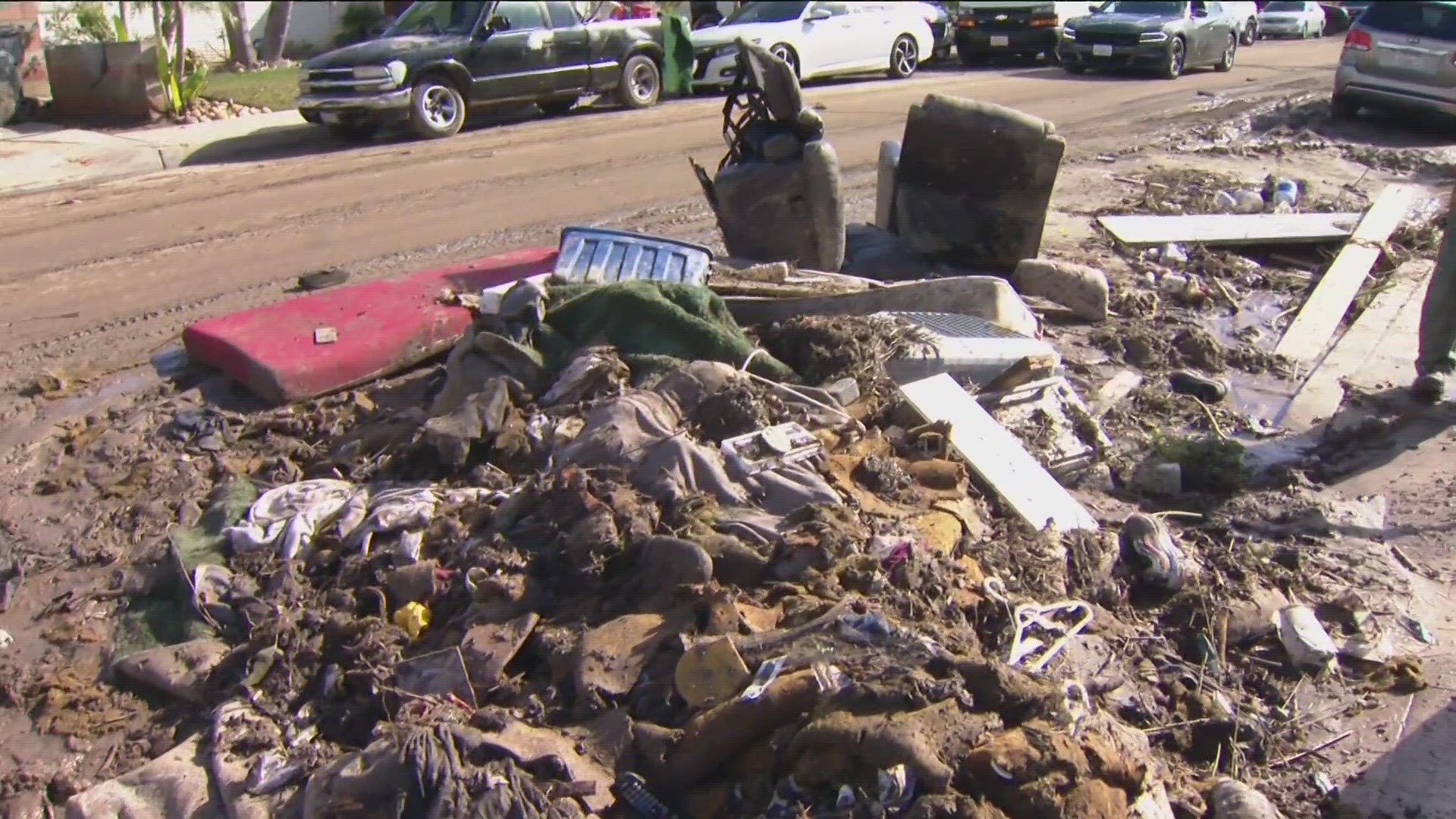 Irvin Torian tells CBS 8 he spends 18 hours a day cleaning up the home he lives in, which has extensive damage from water and mud.