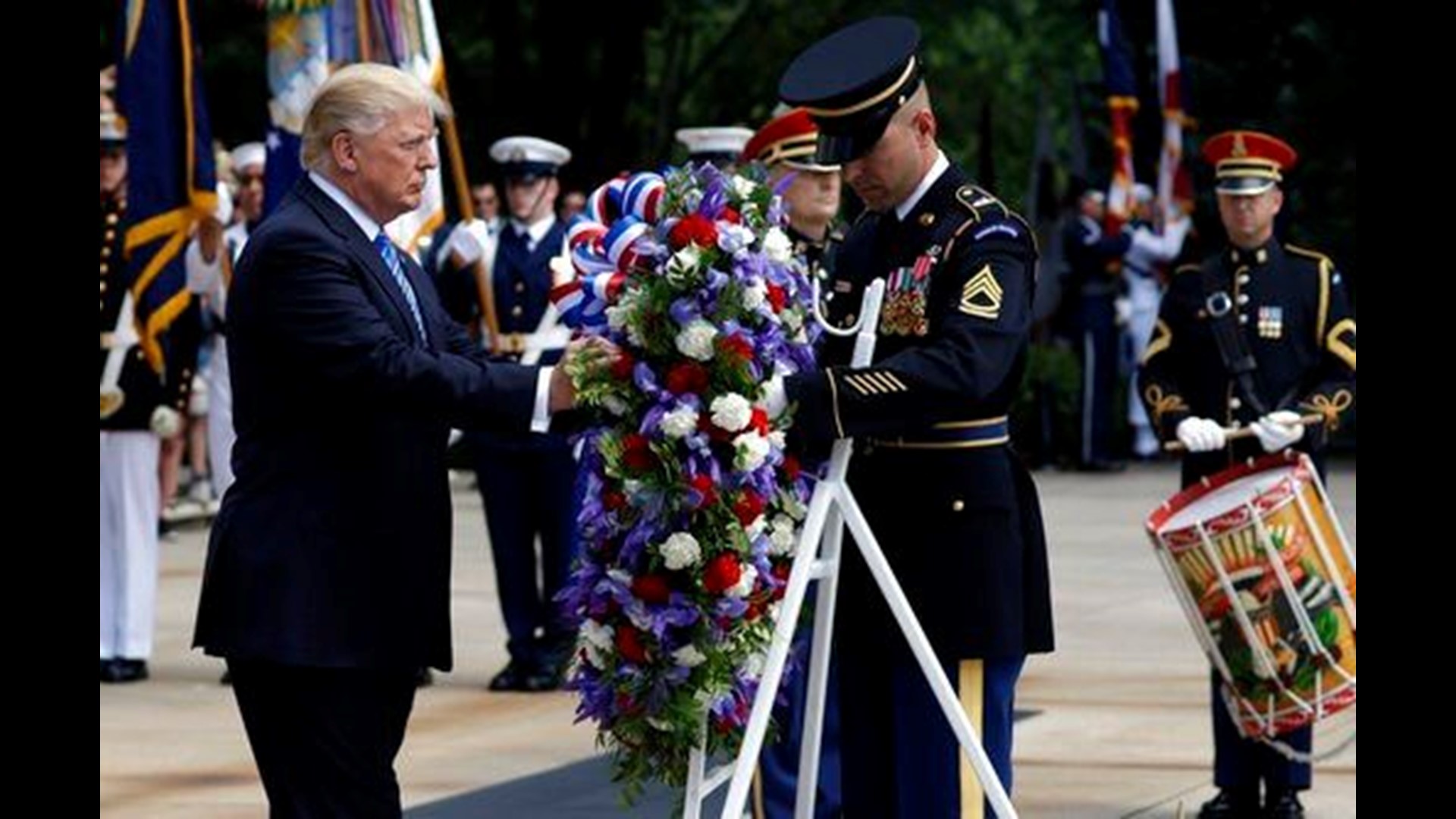 Trump Pays Respect To Military Dead At Arlington Ahead Of Memorial Day