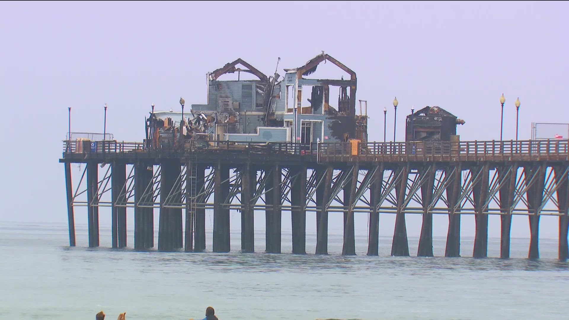 More than 500 athletes rushed the shoreline in droves Monday morning for the 95th Annual Oceanside Pier Swim, tackling the mile-long route around the pier.