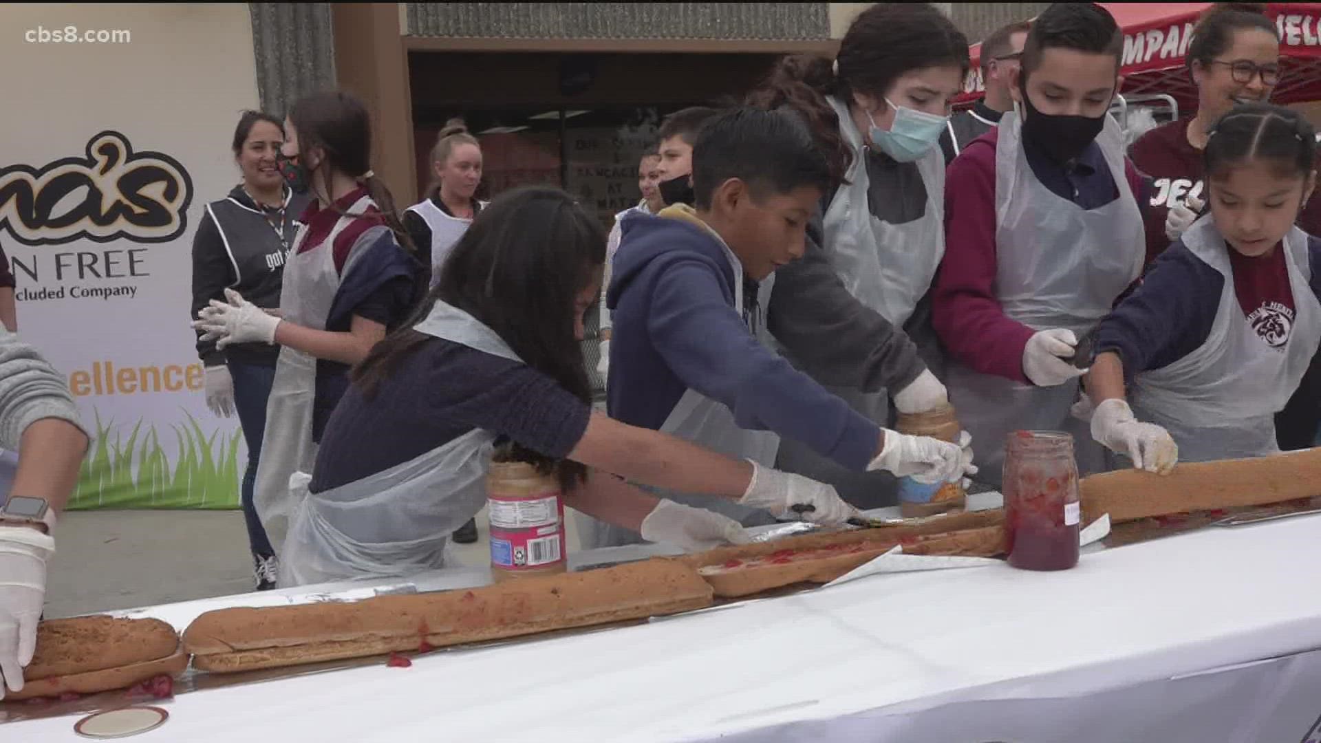 Heritage Elementary Charter school tries to beat the unofficial record of a 107 foot long PB&J sandwich.