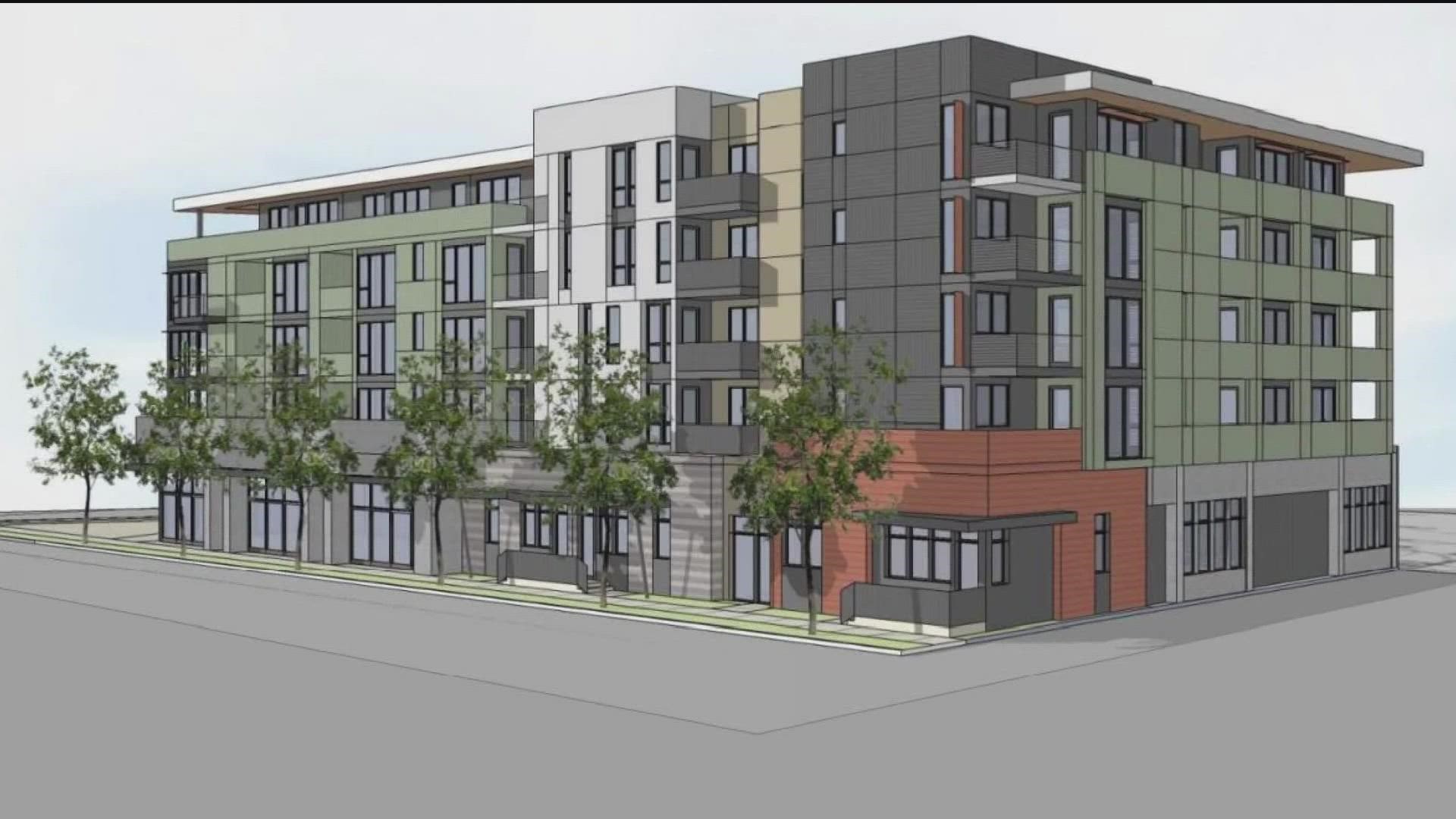 A five-story apartment building proposed for Downtown La Mesa is drawing opposition from people who say it wouldn't fit in with the surrounding area.