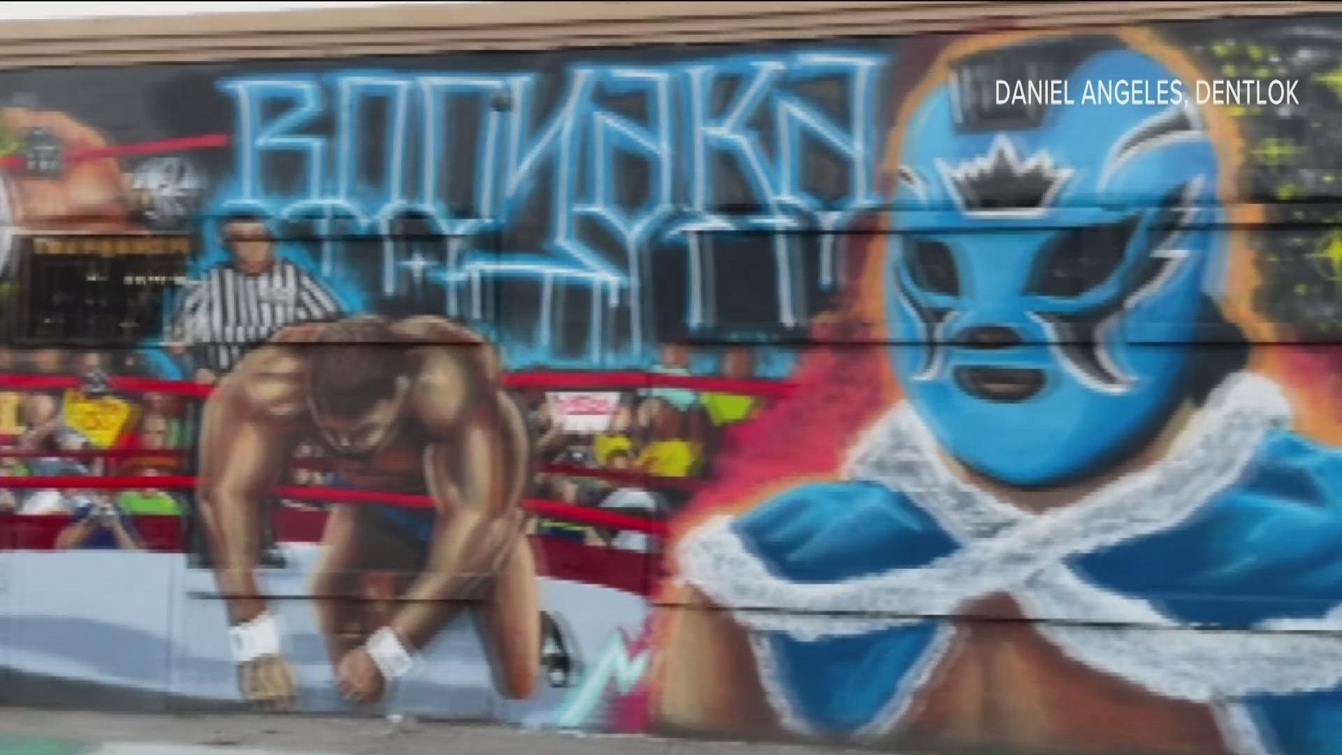 It’s a mural representing the three generations of San Diego County natives and professional WWE wrestlers in the Mysterio family.