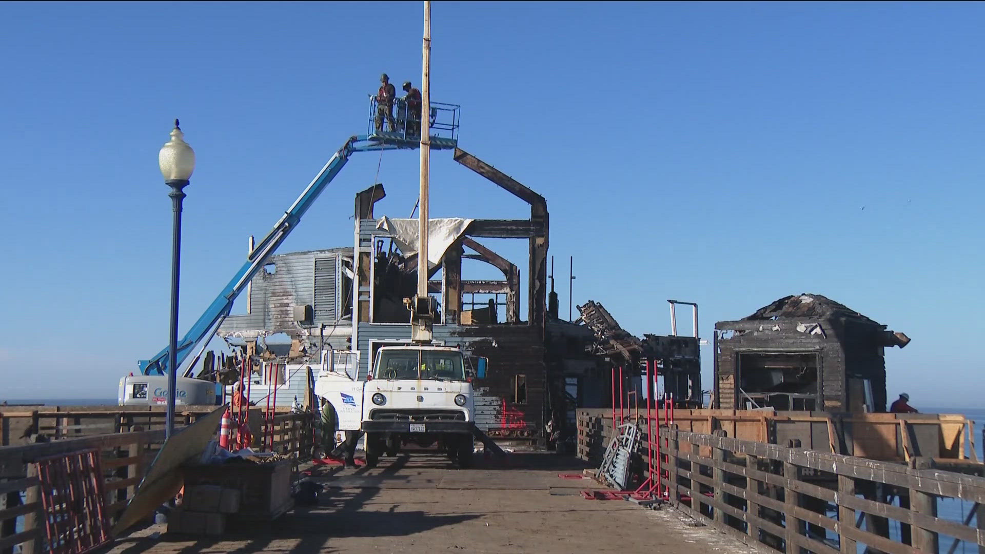 A fire erupted on the end of the pier inside the Ruby's Diner building in April.