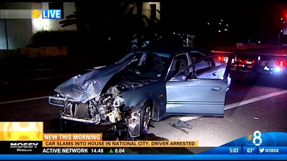 Driver arrested for DUI after car slams into garage | cbs8.com