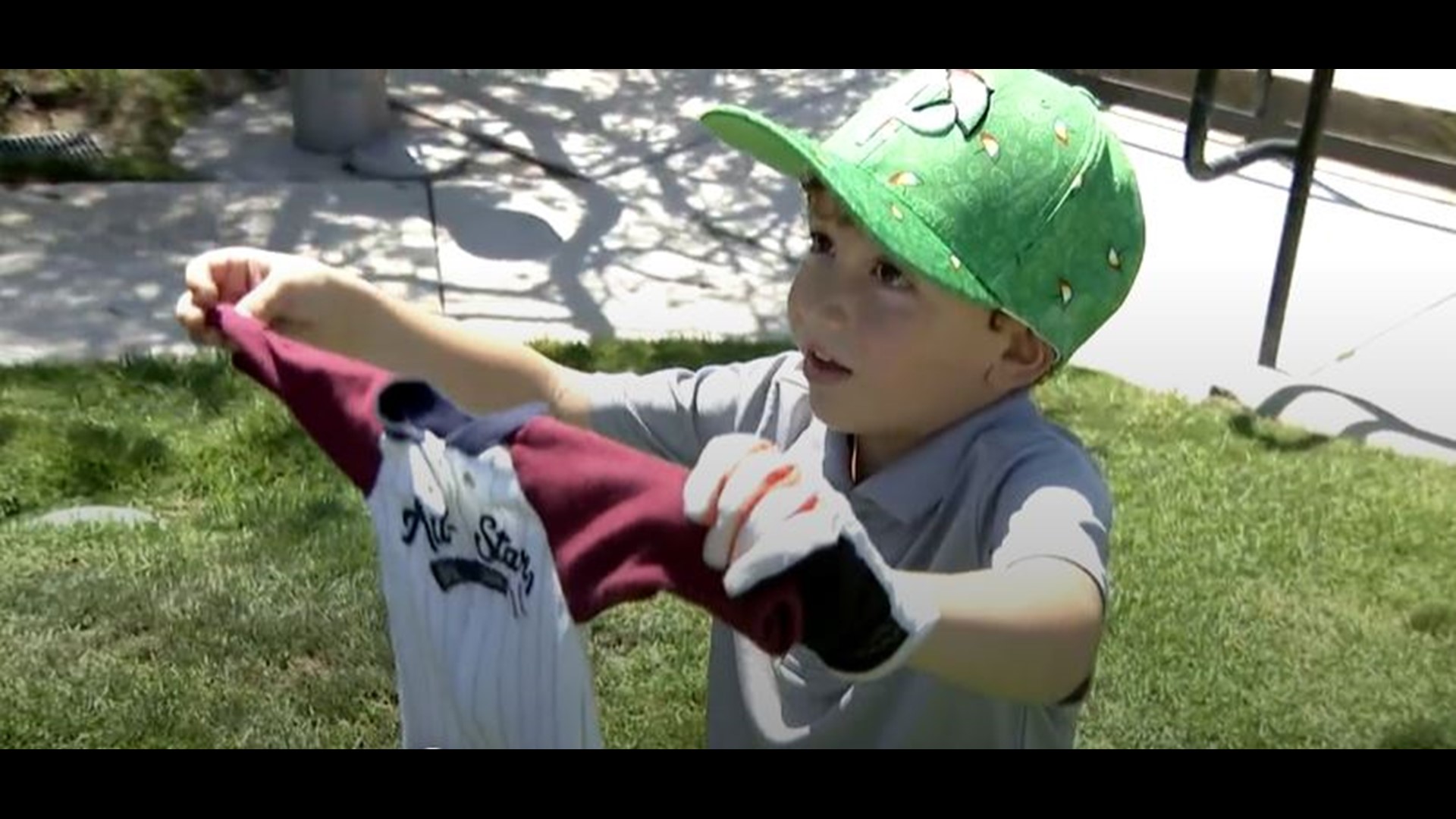 5-year-old golfer, Mikey Manka, who lives with Cerebral Palsy is honored at a golf course before a fundraiser hoping to raise money for the disease's cure.