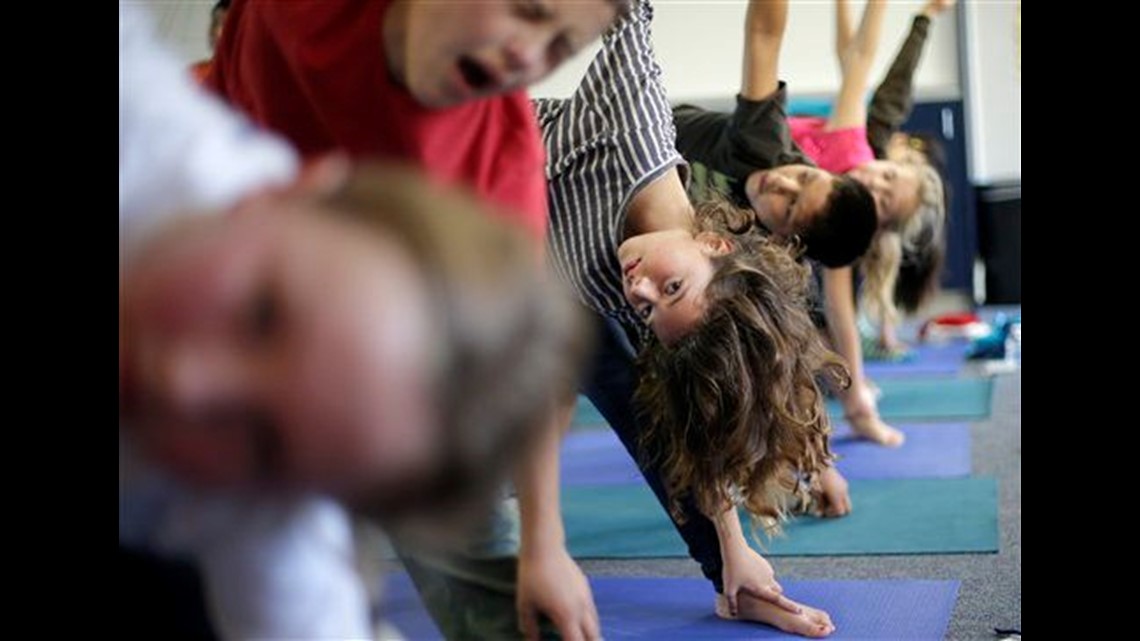School yoga tries to avoid religious controversy