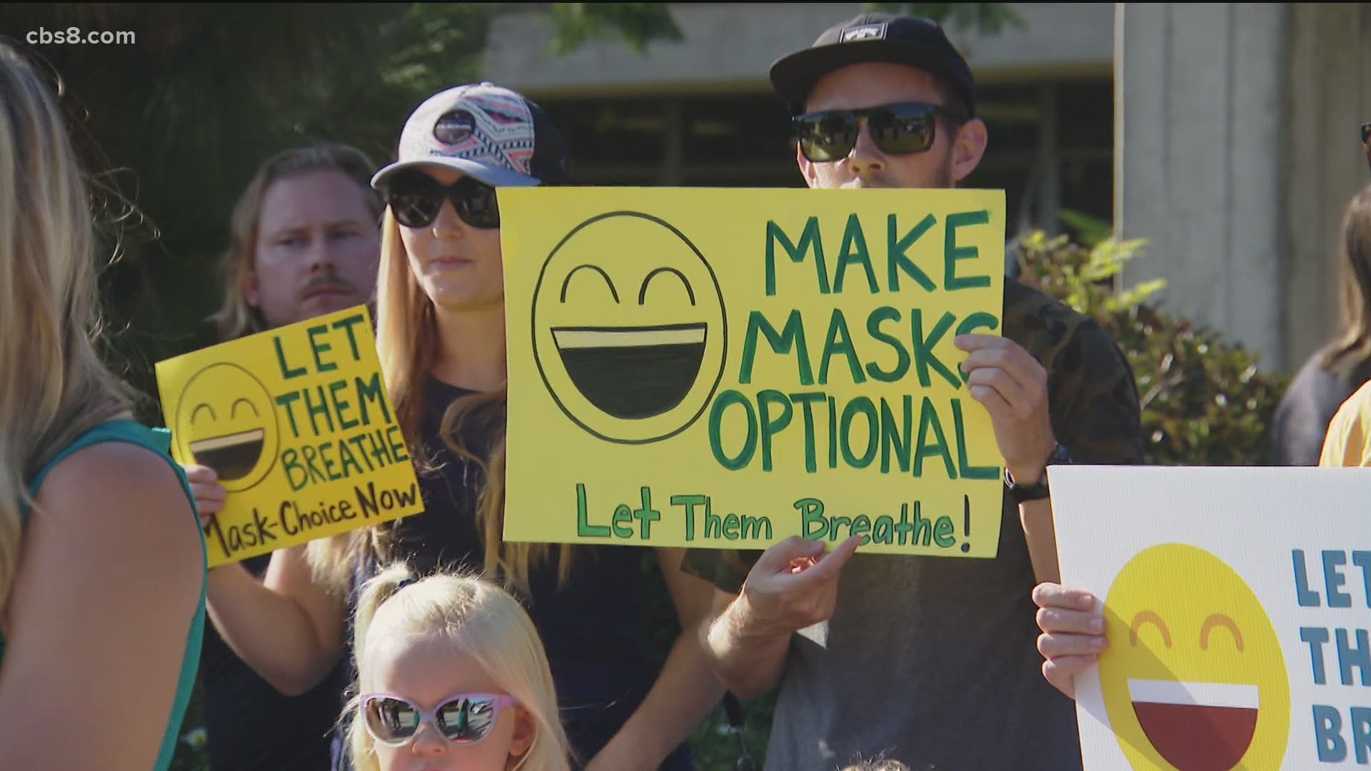 A demonstration was held outside the SDUSD board meeting with parents, teachers, and students waving signs calling for masks to be optional in classrooms.