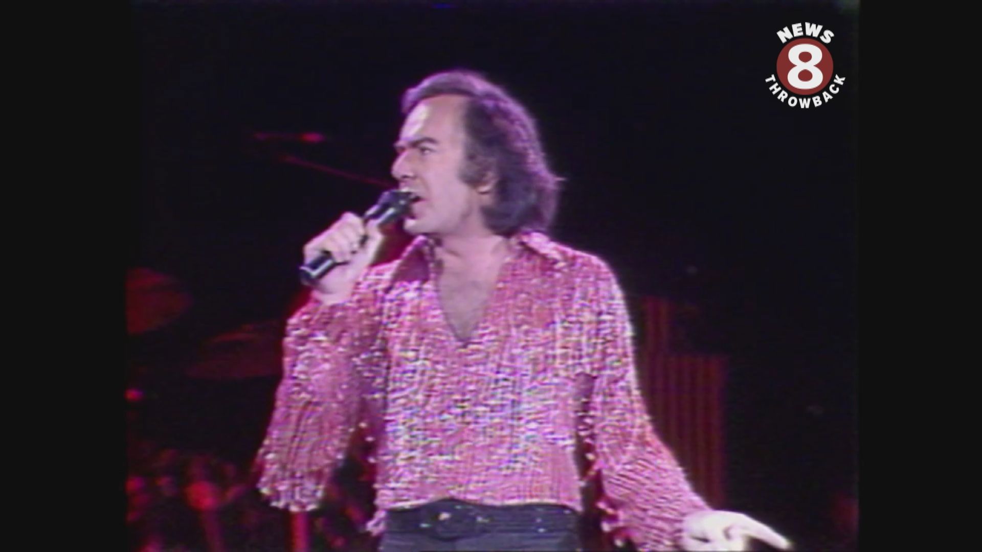 October 26, 1983 Superstar Neil Diamond sings 'America' at the San Diego Sports Arena.