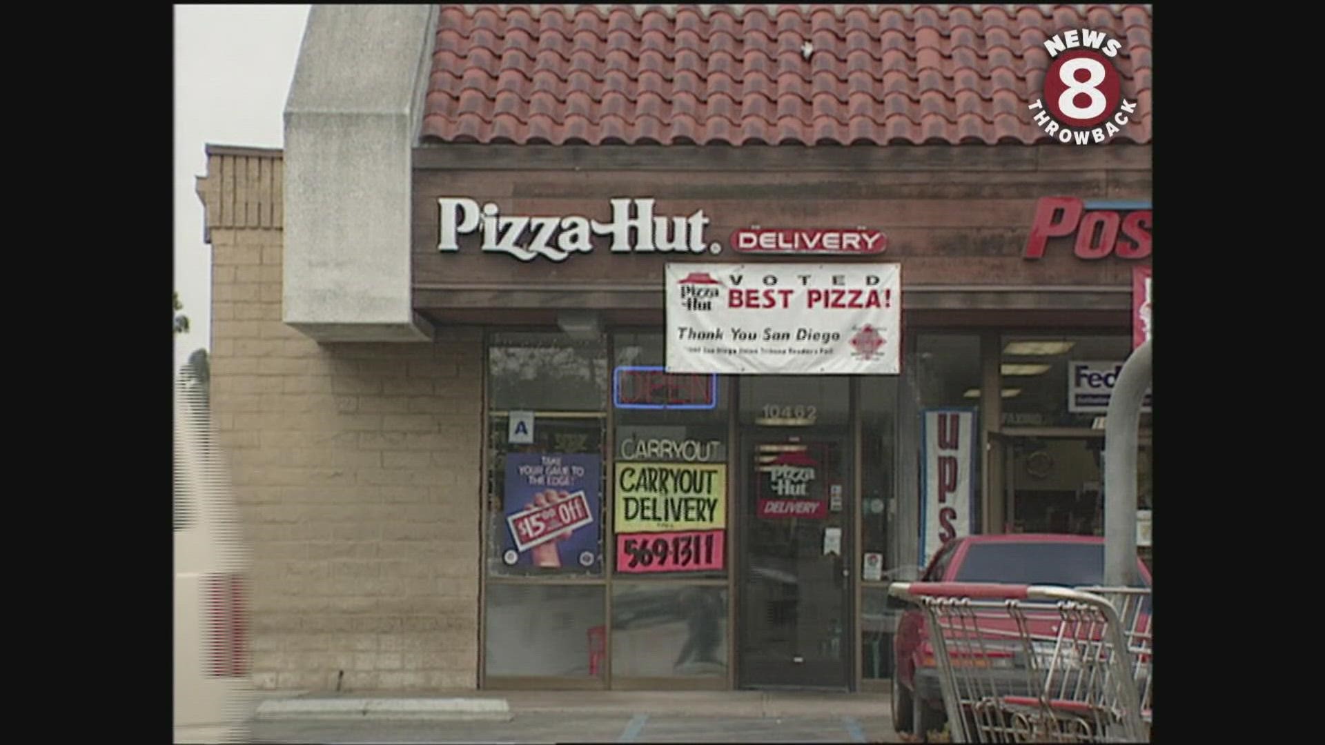 News 8 employees eat pizza