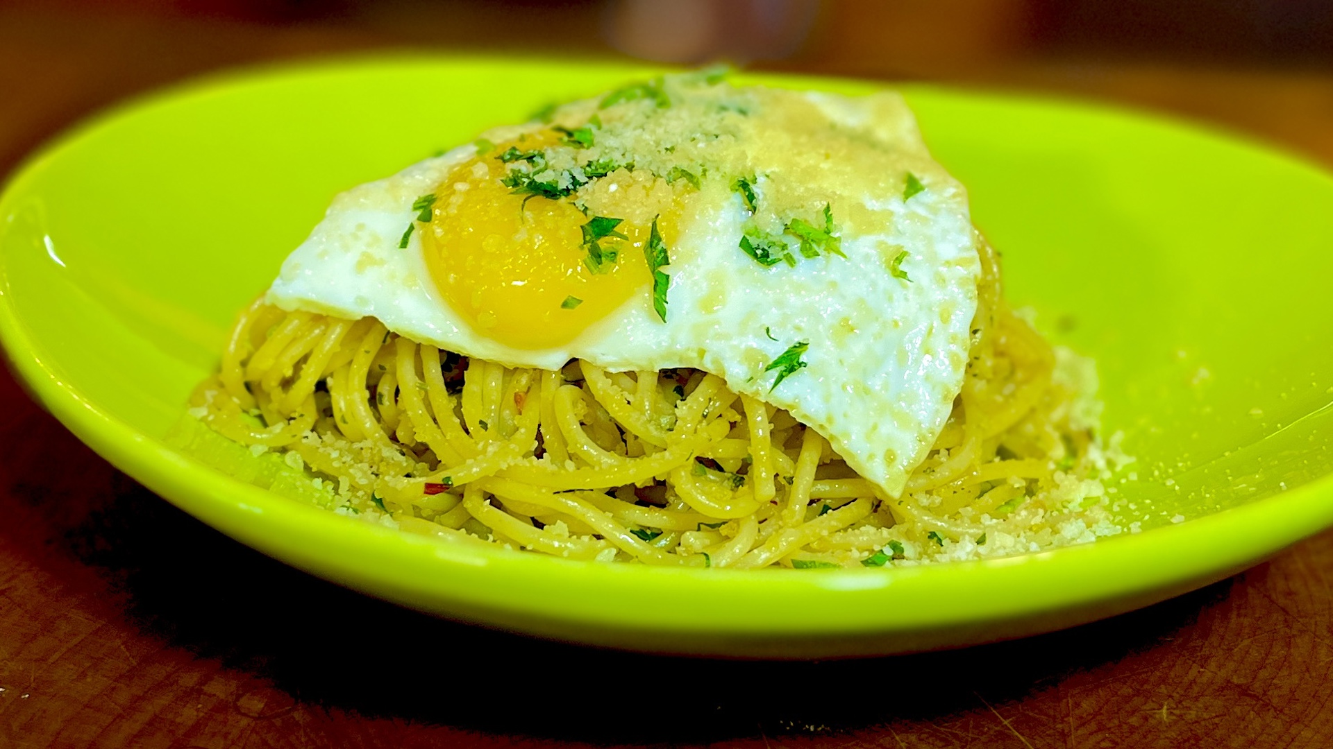 When you break the yoke over the pasta toss it in for a luxurious coating for the spaghetti!