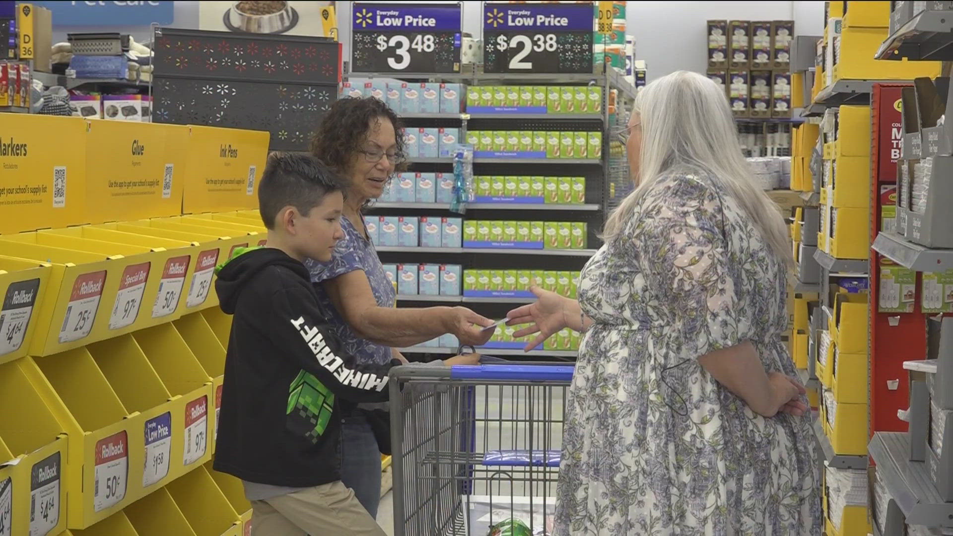 Walmart gave out $100 gift cards to eight customers shopping in the back to school section.