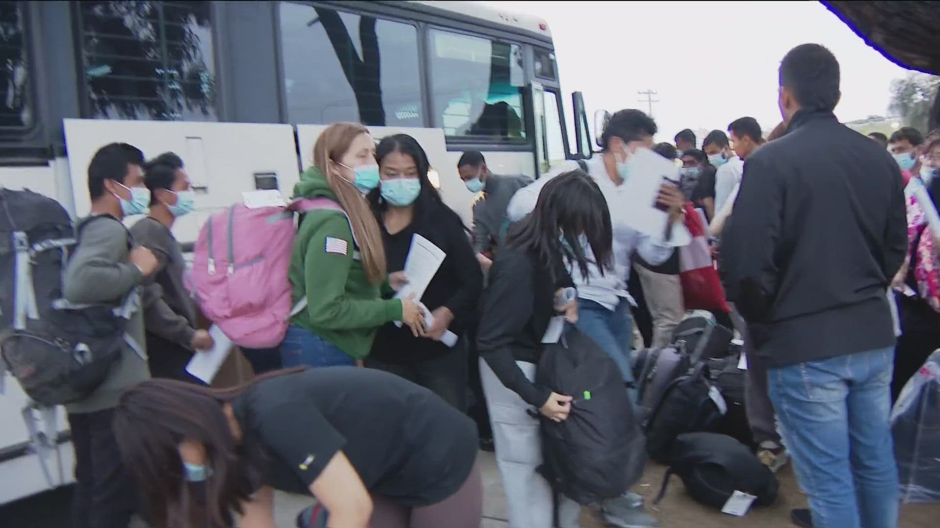 Migrants seeking asylum continue to be dropped off in San Ysidro by Border Patrol with little information on what to do next. Volunteers are stepping in to help.