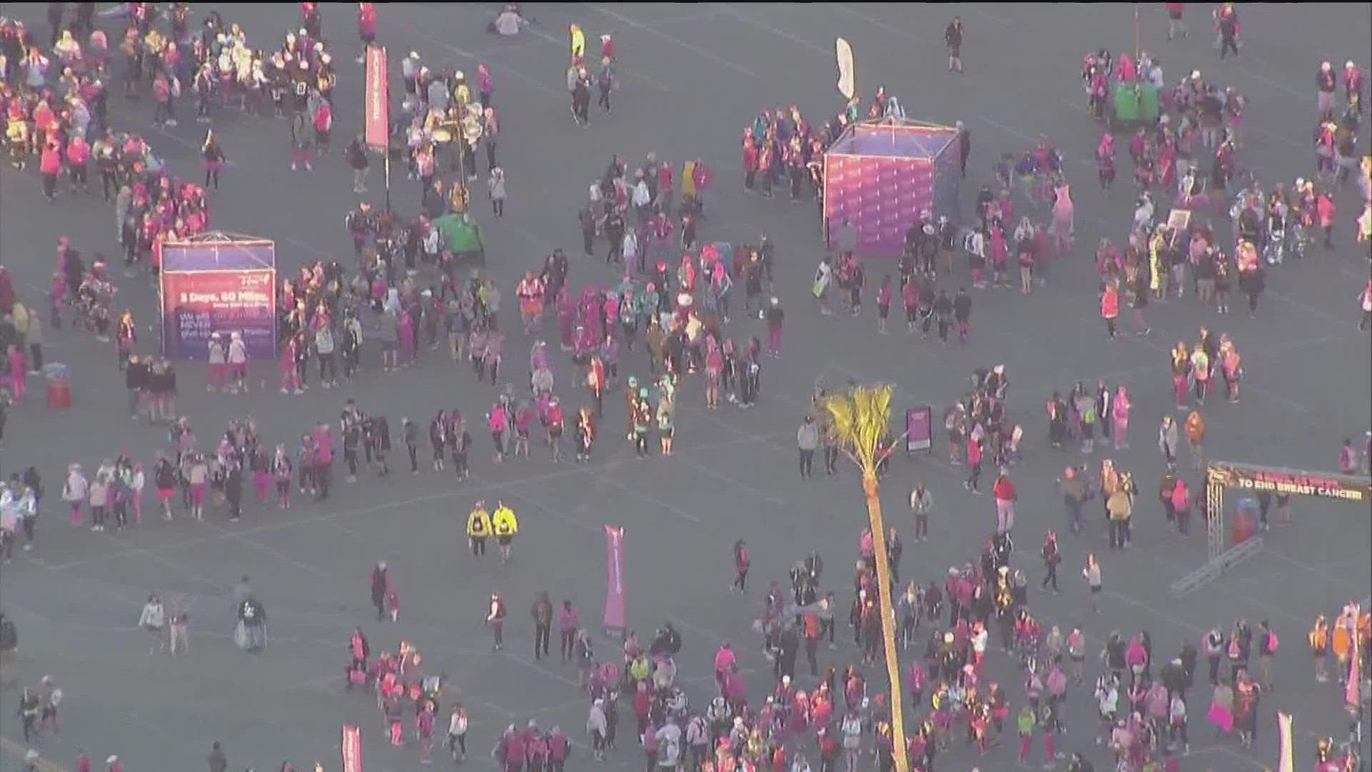 About 2,000 people began their 60-mile walk early Friday morning in a united effort to fight for a world without breast cancer, raising a total of $5.3 million.