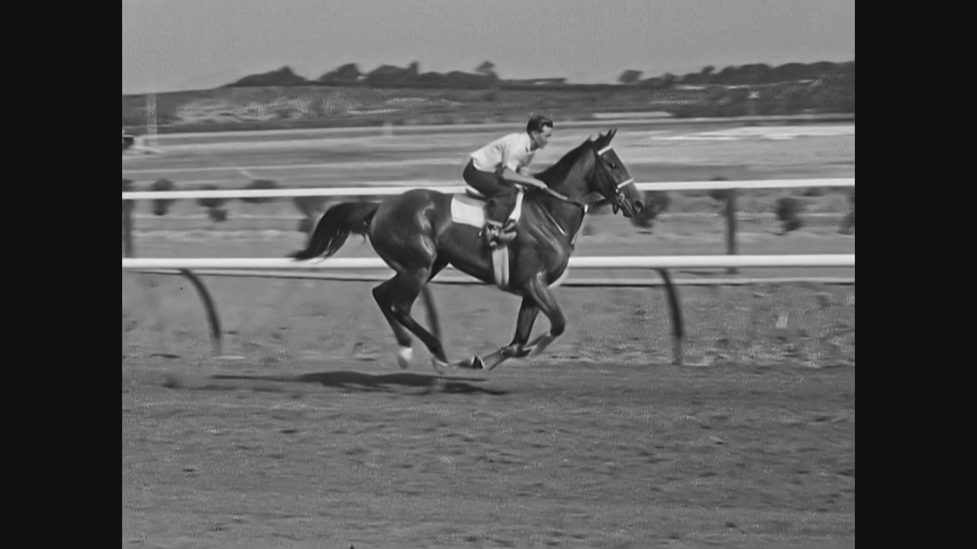 July 18, 1957 The track is being worked on a round-the-clock basis so the ground will be just right for the thoroughbreds come opening day.