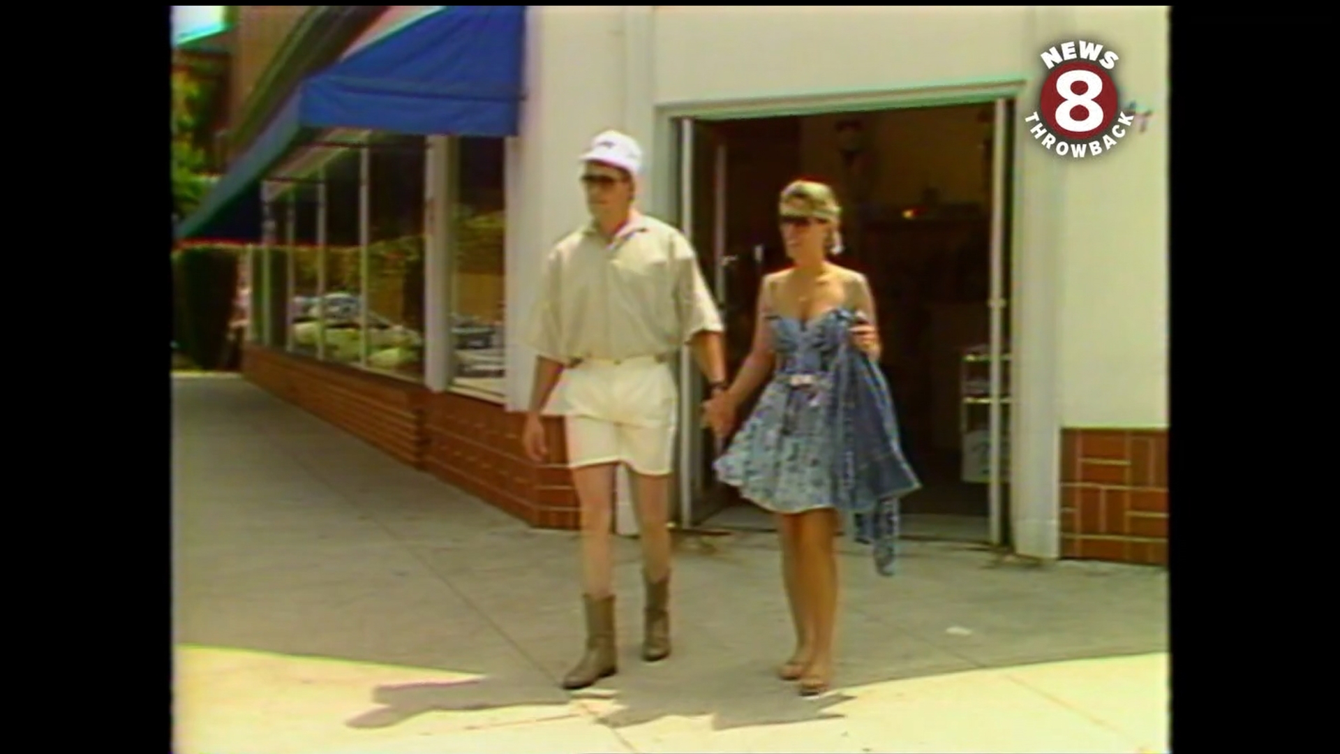 This couple tried on all the "cool" looks of the summer season in a La Jolla boutique in May 1988.