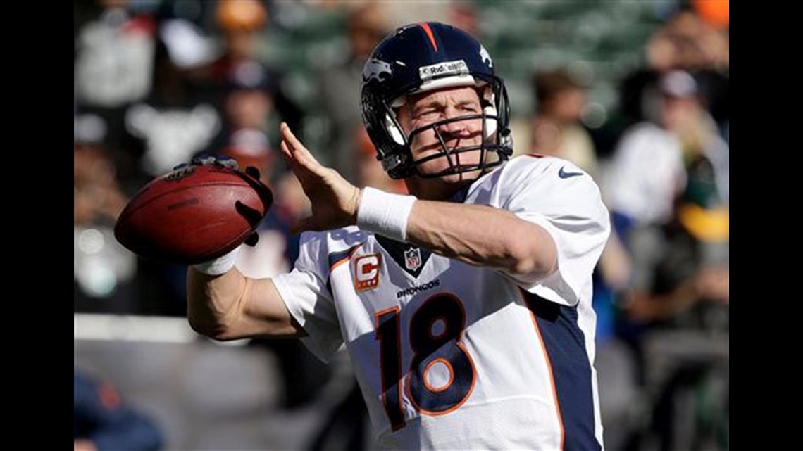 Manning sets NFL record after throwing 51st touchdown pass