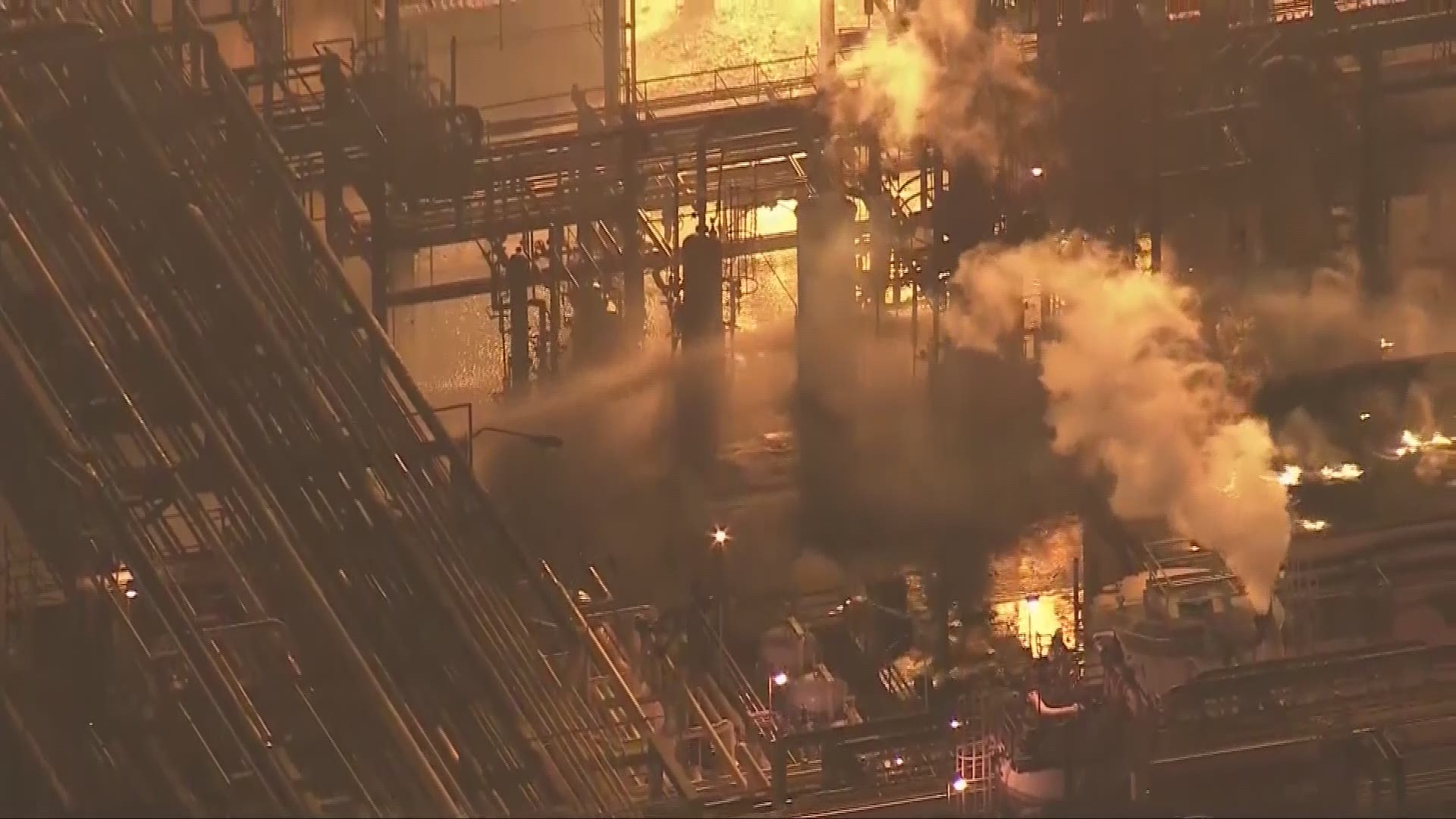 Firefighters made progress Wednesday in reducing the size of a fire at the Marathon Petroleum Refinery in Carson that was sparked by an explosion in a cooling to