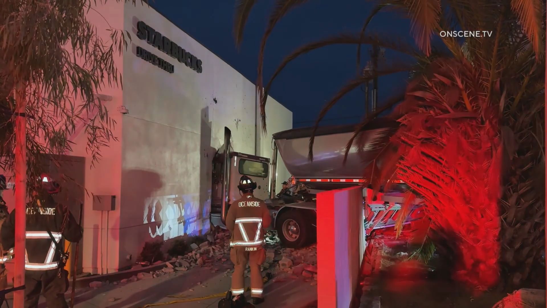 The driver and a Starbucks employee were taken to a hospital with non-life-threatening injuries.