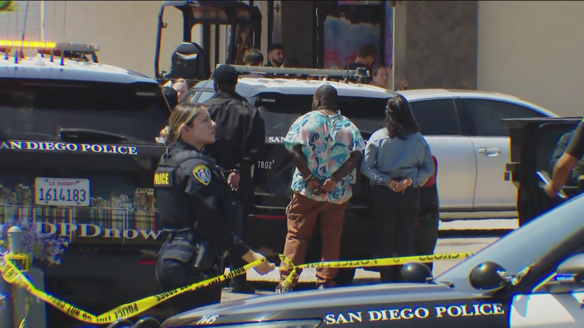 It is still unclear why the people at the scene of the deadly shooting are being detained.